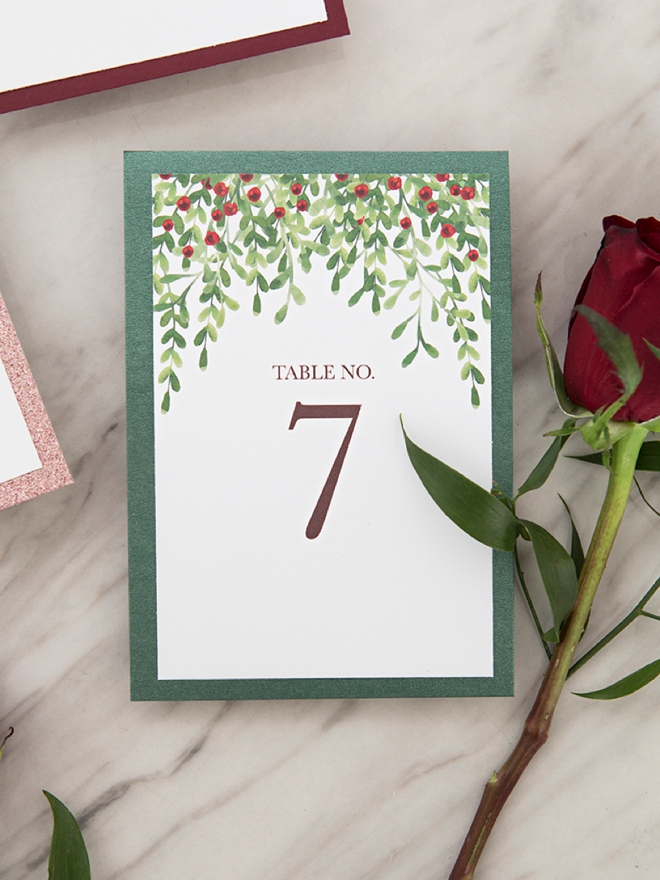 These FREE Printable Holiday Holly Inspired Table Numbers 